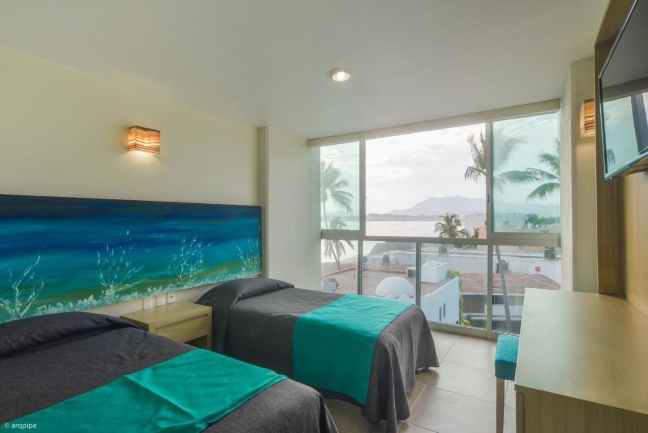 Hm Hotel 曼萨尼约 外观 照片